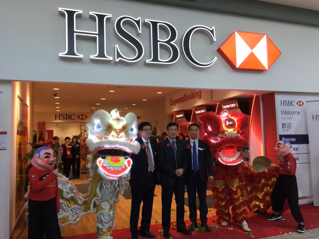 Lions and HSBC staff at the opening of a new HSBC branch